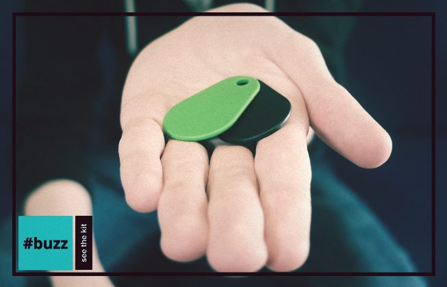 Hand holding thin contactless keyfobs