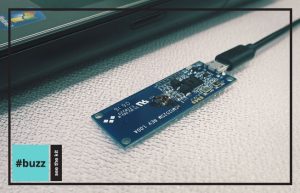 ACM1252U-Z2 USB NFC module connected to a laptop